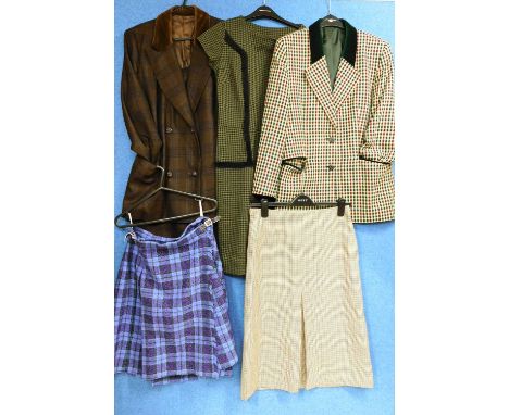 A quantity of ladies wear: to include a tweed check skirt by Daks, London; a Scottish wool kilt; a green, red and blue single