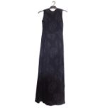 A c.1960's black shift evening dress, with crepe leaf design all over, open back with button