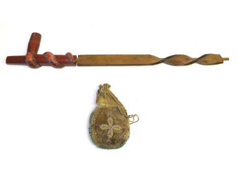 A Late 19th/Early 20th Century North American Plains Indian Ceremonial Pipe, possibly Sioux, the red Catlinite (Pipestone) cy