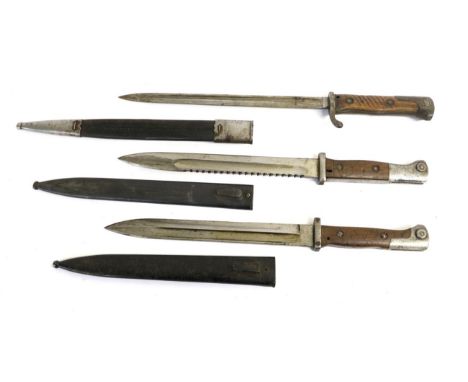 A German M84/98 NCO's Saw Back Bayonet, the blade stamped GOTTLIEB HAMMESFAHR, SOLINGEN, FOCHE, with blued steel scabbard; a 