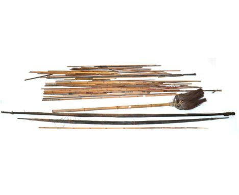 A 19th Century Indonesian Black Palm Wood Self Bow, possibly Papua New Guinea, one end lightly carved and stained with stylis