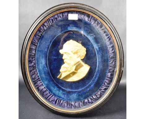A 19th Century relief gilt ormolu plaque depicting Charles Dickens. The highly detailed side portrait profile depicts Dickens