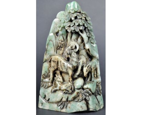 A 19th Century Chinese Qing Dynasty hand carved jade / hardstone panel. The panel depicting horned goat / mountain goat with 