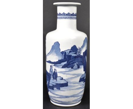 A 19th Century Chinese Qing Dynasty Kangxi manner blue and white porcelain vase of Rouleau shape. The vase having hand painte