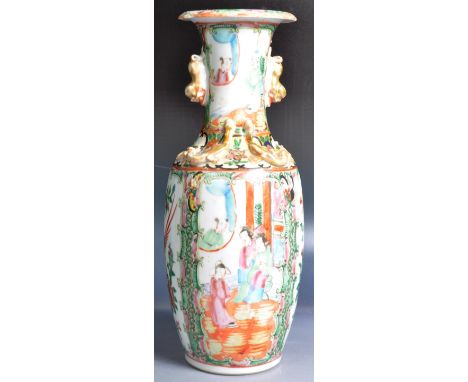 A 19th Century Chinese Cantonese Canton region porcelain vase having hand painted enamel Famille rose decoration with white c