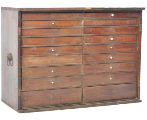 A 19th Century Regency period flame mahogany specimen cabinet / collectors cabinet comprising of two banks of 9 drawers set w