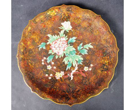 An early 20th Century Chinese / Oriental Qing Dynasty cloisonne footed serpentine edged plate. Decorated in the cloisonne sty