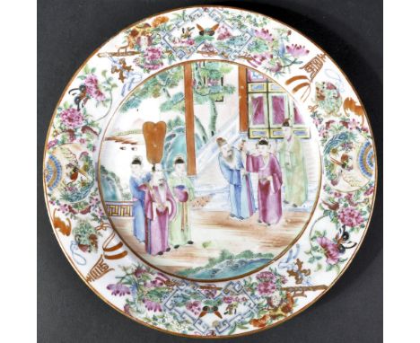 A 19th Century Chinese Cantonese Canton region porcelain charger plate having hand painted polychrome enamel decoration depic