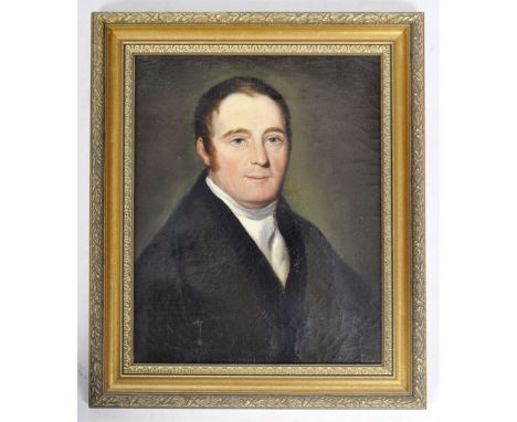 A 19th Century oil on canvas painting portrait study depicting a gentleman in black suit jacket with white shirt. Notation to