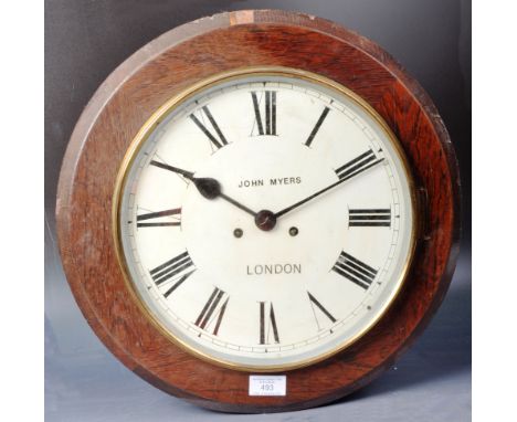 A 19th Century Victorian rosewood circular wall clock by John Myers of London. The central dial having a white enamel ground 