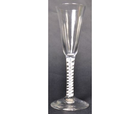 An 18th Century George III glass wine / ale drinking glass having an opaque twist double series stem with waisted bell shaped