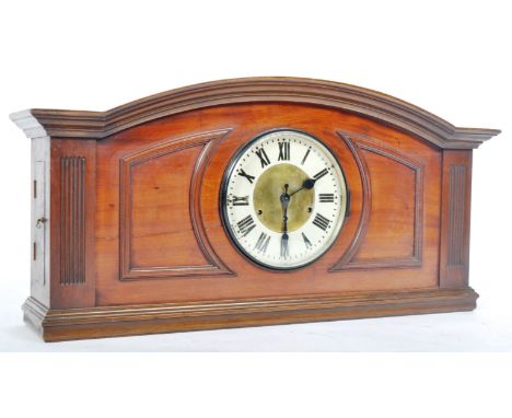 An Edwardian gentlemans club house / internal shopfitting clock pediment having an arched top with central clock face having 