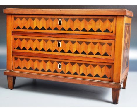 A 19th Century Italian walnut &amp; specimen wood apprentice piece chest of drawers commode having a circular Sorento stencil