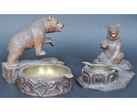 Two large 19th Century German hand carved Black Forest figural bear ashtrays comprising of an example with two off centre res