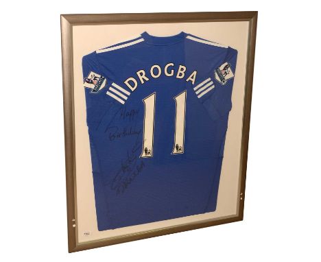 A Chelsea football shirt signed by Didier Drogba, in glazed frame.