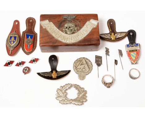 A collection of WWII and later German badges and buttons, comprising; three Hitler Youth enamel pin badges, a DAP enamel badg