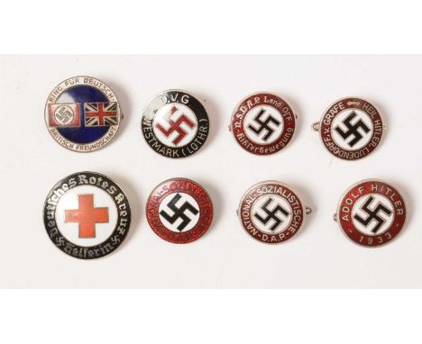 A collection of WWII enamel lapel badges, comprising; an Adolf Hitler 1933 badge, marked RZM M1/29; an Austrian NSDAP badge 1