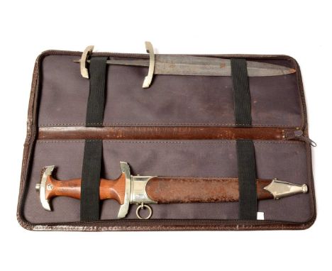 Two WWII type SA daggers, comprising; an SA Dagger, the 20.5cms double-edged blade inscribed 'Alles fur Deutschland', with ma