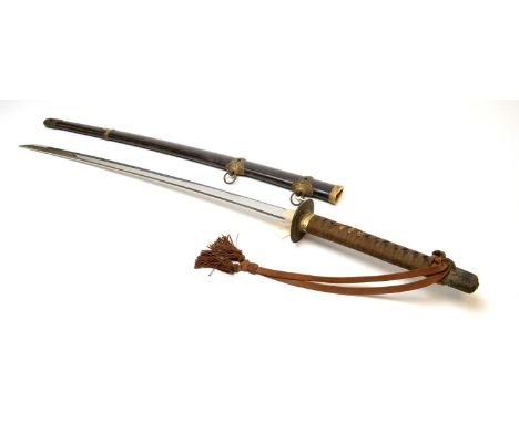 An early 20th Century Japanese sword, the 65cms single-edged blade, with iron tsuba and cord bound grip, in shagreen scabbard