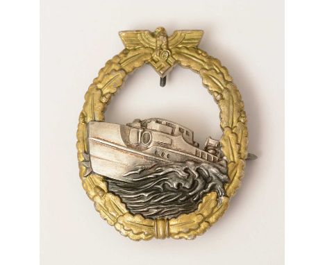 A WWII Kriegsmarine E Boat war badge, first pattern and with makers mark for Schwerin Berlin 68, with sword-shaped pin and un
