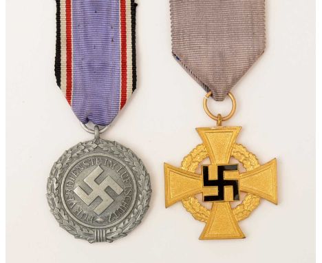 A WWII German Air Defence medal 1938, with original suspension ribbon; together with a Faithful Service medal, first class (4