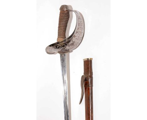 WWI Cavalry Officer's sword, 1912 pattern, the 87.5cms single edged fullered blade numbered 12961, on a hilt with large knuck