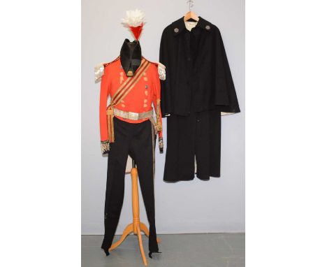 A Lord Lieutenant's uniform, comprising: bicorn hat with feather plume (tin for plume only), red-breasted jacket with silver-