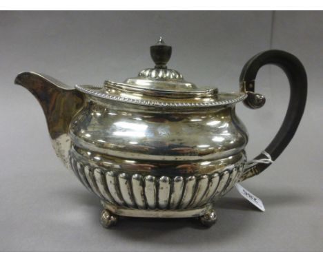 Victorian Silver Teapot, squat form with part lobed body, ebony handle and finial, Sheffield 1886