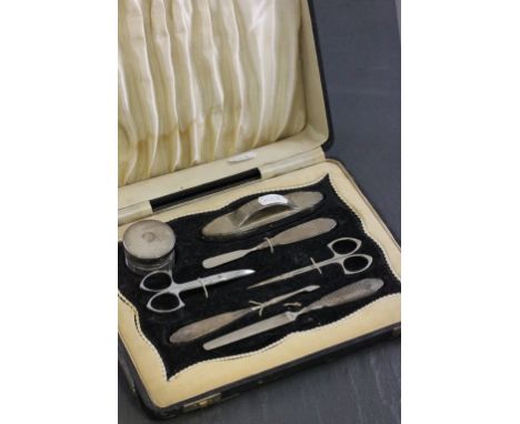 Art Deco Cased Seven Piece Manicure Set with engine turned Silver Handles, Birmingham 1936 / 37 Daniel Manufacturing Company