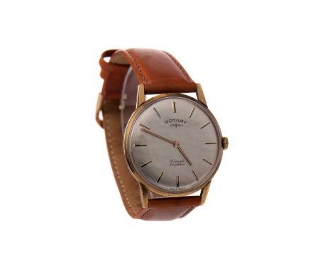 GENTLEMAN'S ROTARY NINE CARAT GOLD CASED MANUAL WIND WRIST WATCH,the round cream dial with applied baton hour markers, 33mm c