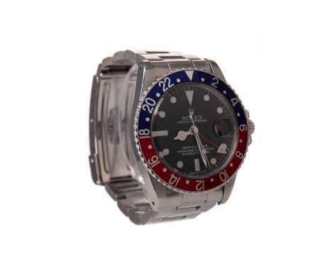 ROLEX OYSTER PERPETUAL GMT MASTER PEPSI STAINLESS STEEL AUTOMATIC WRIST WATCH,model number 1675, serial number 1378648, circa