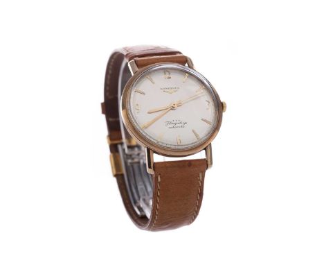 GENTLEMAN'S LONGINES FLAGSHIP NINE CARAT GOLD AUTOMATIC WRIST WATCH,the round cream dial with applied Arabic and baton hour m