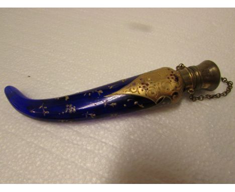 Blue glass scent bottle with curved terminal, gilded to the shoulder and with florets and white and red enamel dots, hinged g