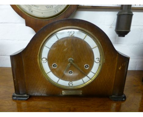 An oak cased striking mantle clock with a set of eight gongs by Schatz and Sons Germany, with presentation label to William W