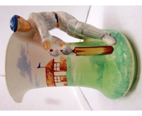 Burleigh Ware pottery cricket jug painted green and cream, the handle moulded as batsman,  manufacturer's beehive transfer ma