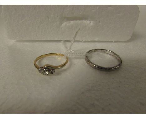 18ct white gold ring, 3.8g; and an 18ct gold diamond engagement ring with cross-over setting (one stone absent), 2g