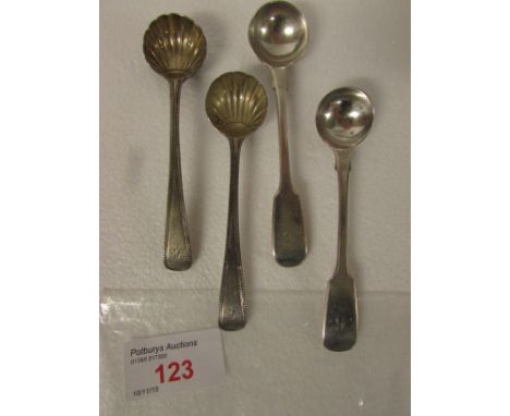 A pair of Victorian silver gilt salt spoons, beaded stems, scallop bowls, monogrammed K, marks for London, 1861, makers stamp