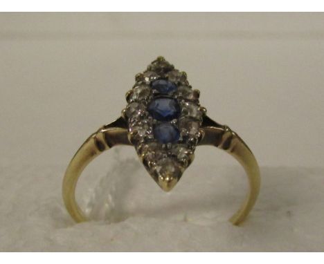 Sapphire and diamond ring on thin gold shank (three sapphires and twelve small diamonds)