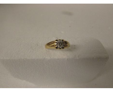 18ct gold ring set with solitaire diamond estimated at 0.5 carat, worn hallmarks