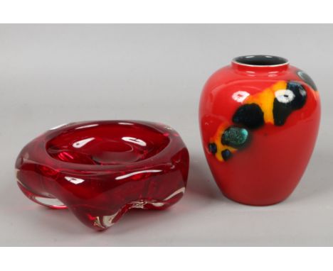 A Poole red ground baluster vase and a Whitefriars style ruby red glass bowl.