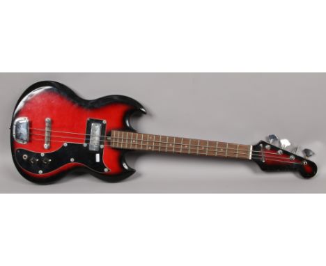 A Gibson SG style electric bass guitar.Condition report intended as a guide only.Missing one string.