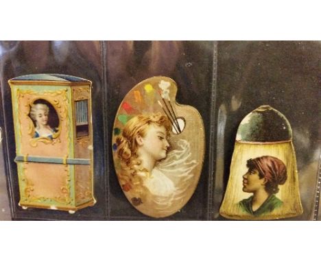 KINNEY, Die-Cut Novelties, inc. palette, camera, jewellery box, fan, vase, hot air balloon, travel trunk, lock, lamp, boot et