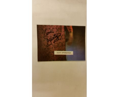 MUSIC, 4.75 x 3.5 piece of a magazine photo of Dusty Springfield, signed by her (first name only), uneven trim, G
