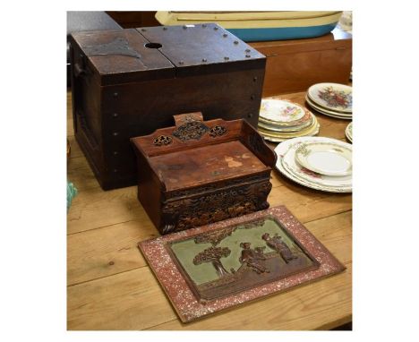 Three items of Chinese wooden ware comprising: a miniature model daybed with carved and pierced back and sides, lift-up seat 