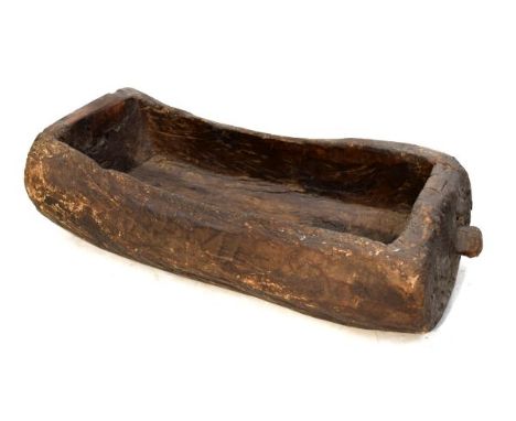 Rustic wooden trough of dug-out design, 77cm wide excluding lug   Condition: 