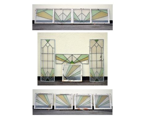 Early to mid 20th Century Art Deco style stained and leaded glass door surround of nine assorted square and rectangular panel