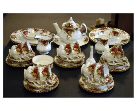 Royal Albert 'Old Country Roses' pattern tea and dinnerwares to include; eight tea cups, saucers and plates, teapot, milk and