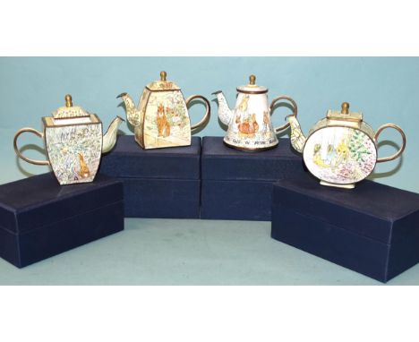 A collection of four Trade Plus Aid Peter Rabbit themed enamel teapots, (boxed), (4). 