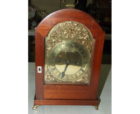 A mahogany arch-shaped bracket clock, the brass dial marked Goldsmiths &amp; Silversmiths Company, 112 Regent St, London, the