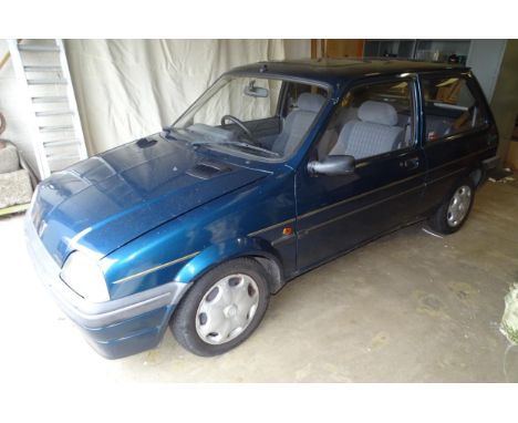 A Rover Metro "Casino Royale" special edition petrol motor car, registered 1994, manual transmission 1120cc engine, blue/gree